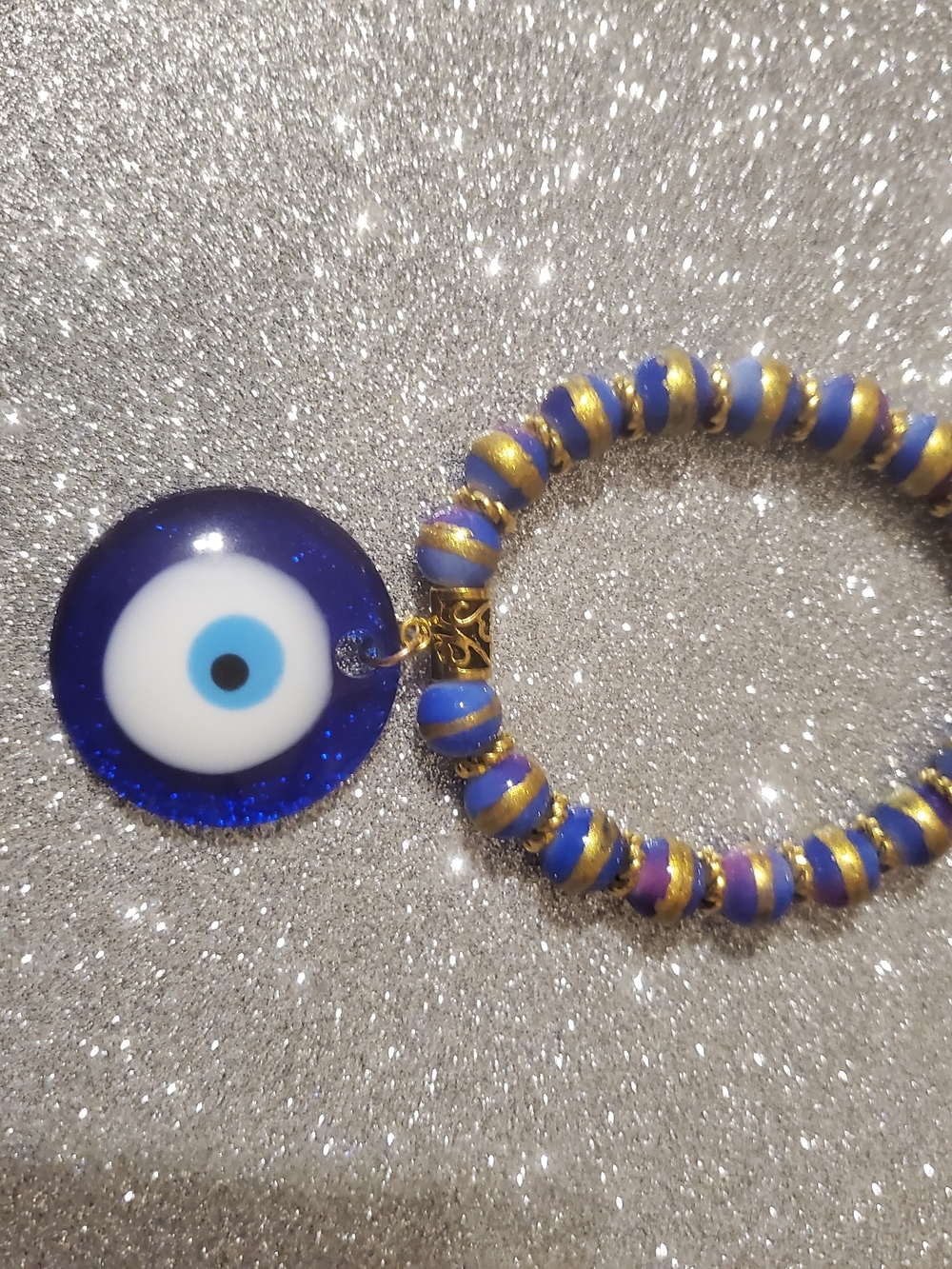 Evil Eye Stretch Bracelet with Blue and Gold Accent Beads
